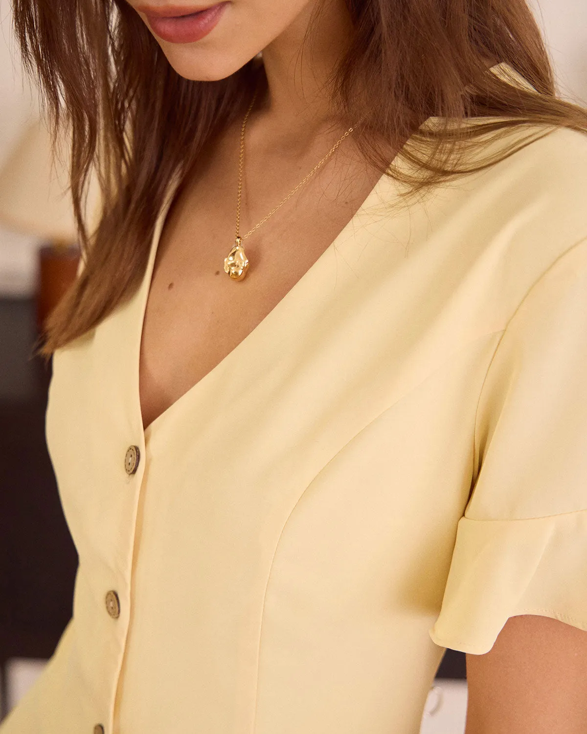 The Yellow V Neck Ruffle Button-up Mini Dress